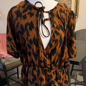 Slightly worn STEIN Curve animal print faux wrap dress